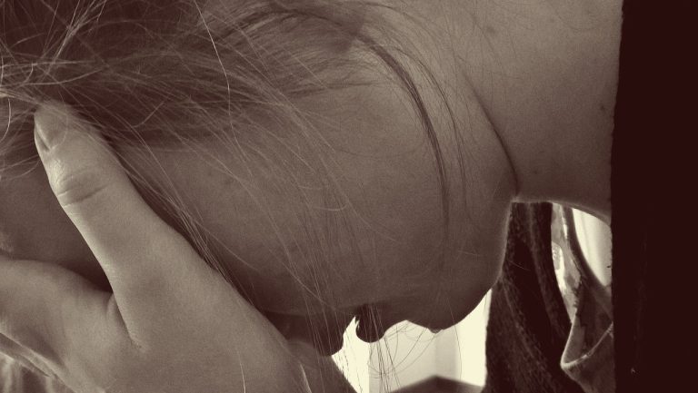 A woman crying.