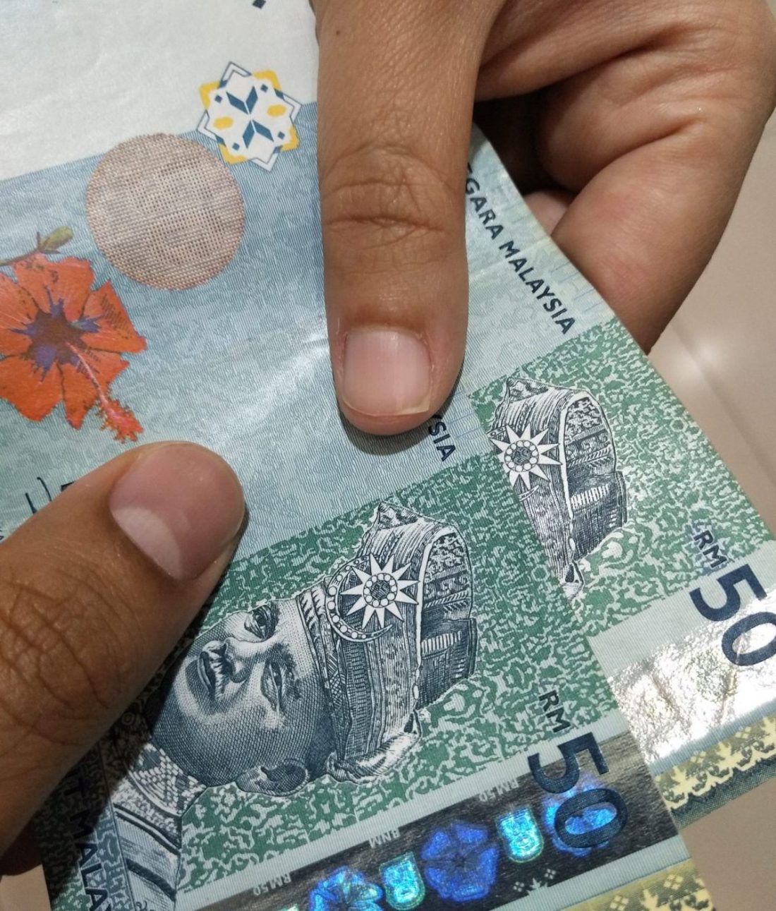 Malaysia duit Discover cara