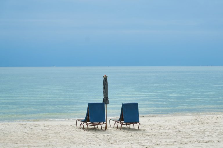 Two empty seats on the beach in Langkawi.
