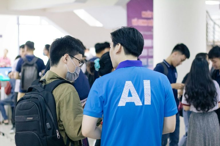 A person wanting to know more about AI during an event.