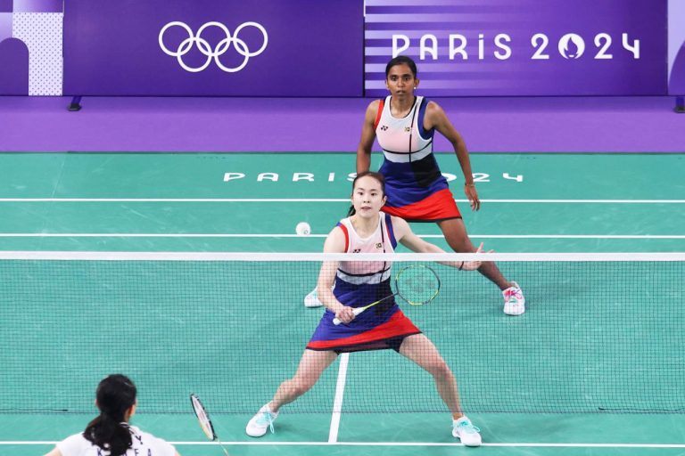 Pearly Tan (front) returns a shot while M. Thinaah waits to attack the net. The Malaysian pair defeated South Korea’s Kim So-yeong-Kong Hee-yong 21-12, 21-13 to reach the quarterfinals of the women's doubles competition at the Paris Olympics. Image: OCM