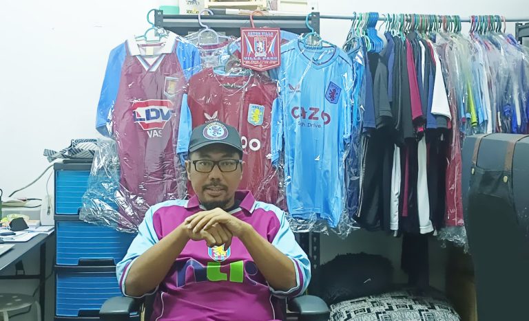 Farid Ja’ah with his collection of Aston Villa kits he has collected through the years.
