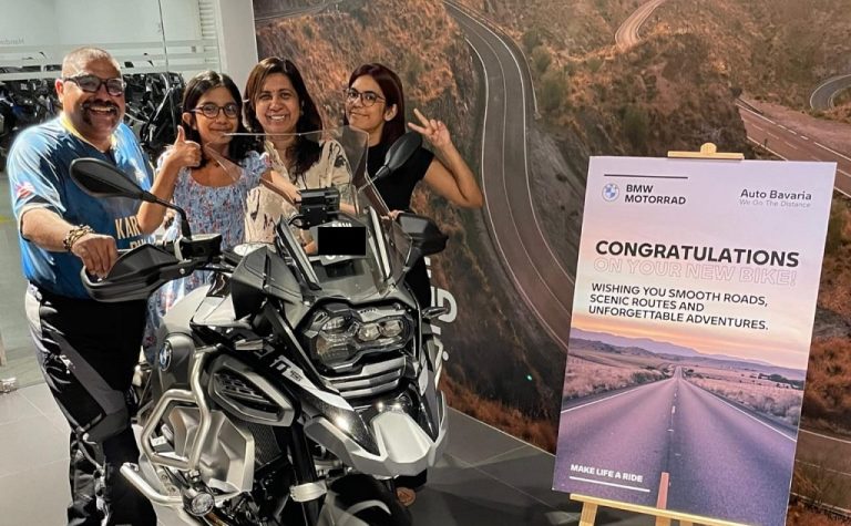 Dr. M. Narendran and his family with his new motorcycle.