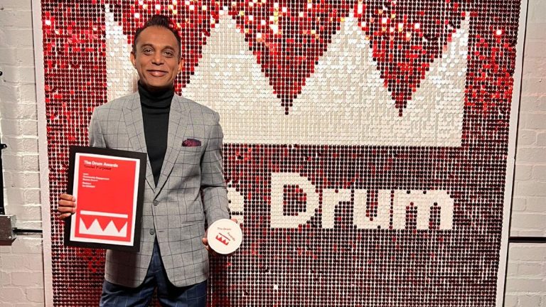Gogulan Dorairajoo, CEO of Rantau+ with the agency's recent wins at The Drum Award 2024.