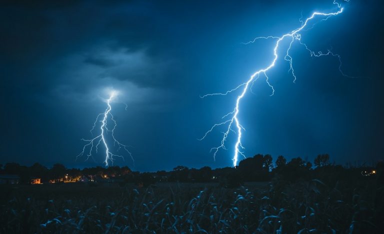 Lightning strikes in a village.