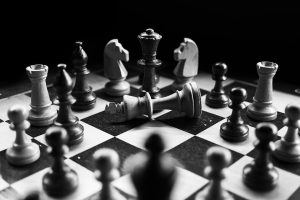 An image of a chess board with pieces on it.