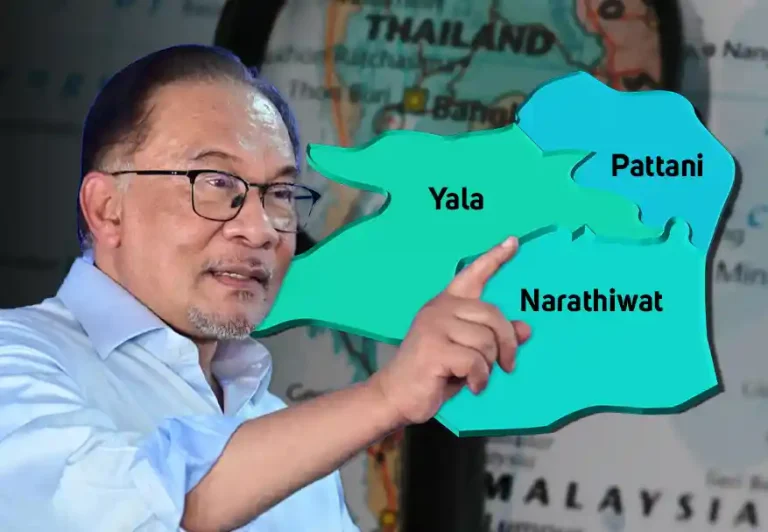 Malaysia Prime Minister Datuk Seri Anwar Ibrahim with the map of southern Thailand in the background.