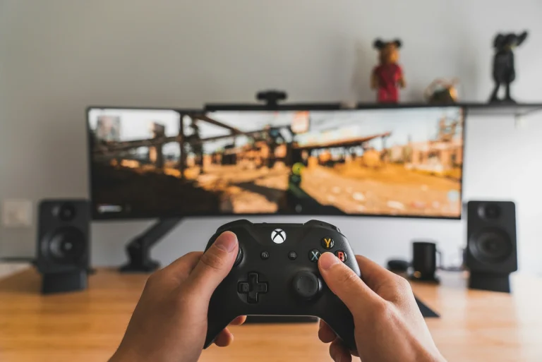 A gamer playing a game on Xbox.
