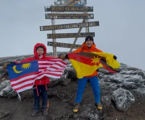 Lois Gywn Peter (left) and Daryll Ambang Tanjong on Mount Kilimanjaro on Aug 19, 2025.