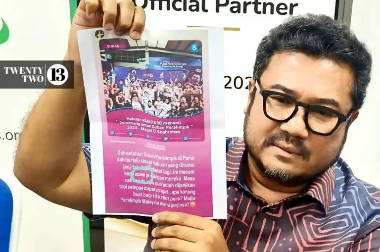 Paralympic Council Malaysia president Datuk Seri Megat D Shahriman Zaharudin shows the social media posting by para shuttler Cheah Liek Hou at a press conference in Kuala Lumpur on Sept 18, 2025.