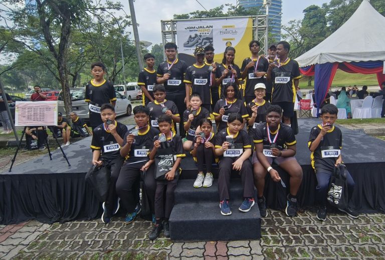Winners in the Boys’ and Girls’ categories with their medals at last year’s event.