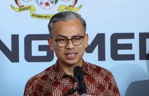 Communications Malaysia Datuk Fahmi Fadzil during a press briefing in Kuala Lumpur on Dec 18, 2025.