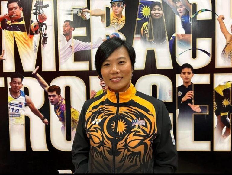 Sharon Wee in a Malaysia tracksuit.