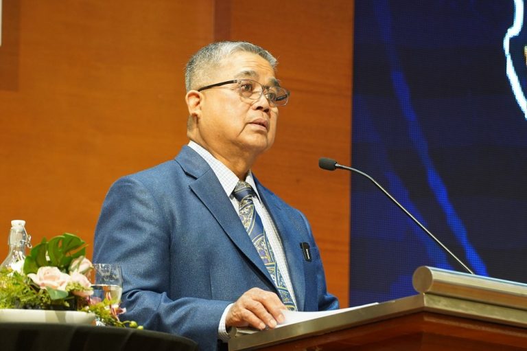 Unity Minister Datuk Aaron Ago Dagang delivering a speech in January 2026.