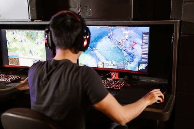 A boy playing computer games.