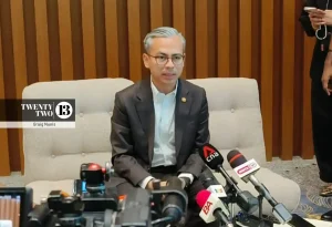 Communications Minister Datuk Fahmi Fadzil speaking to reporters after the launch of the National Scam Response Centre in Cyberjaya.