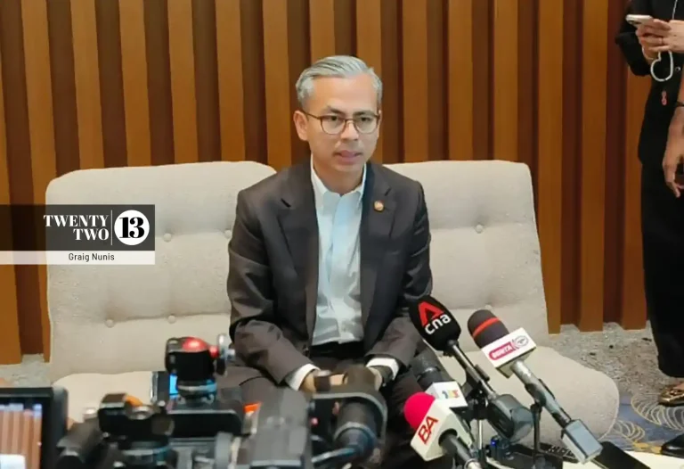 Communications Minister Datuk Fahmi Fadzil speaking to reporters after the launch of the National Scam Response Centre in Cyberjaya.
