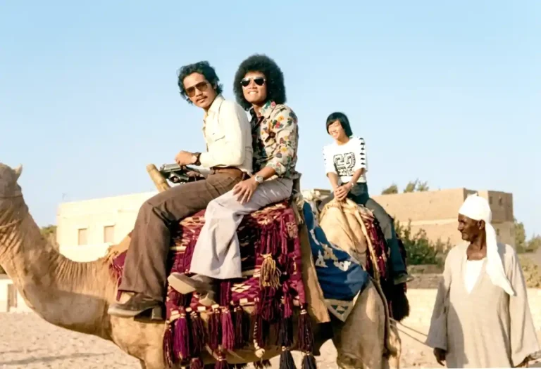 The writer, Capt Johari Mohd Noh (centre), riding a camel with a colleague. This photo was taken in Egypt in the 1980s.