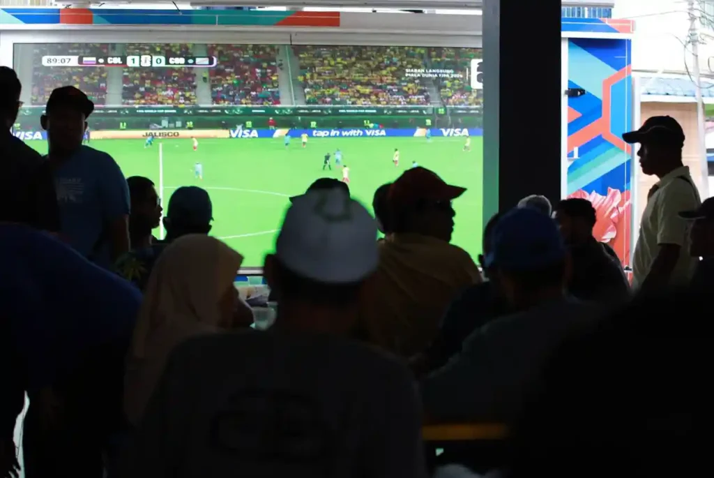 Fans watching a World Cup match in Senggarang, Johor.