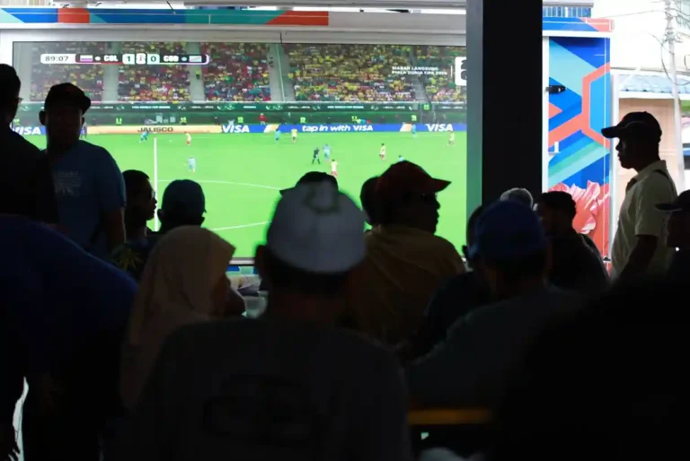 Fans watching a World Cup match in Senggarang, Johor.
