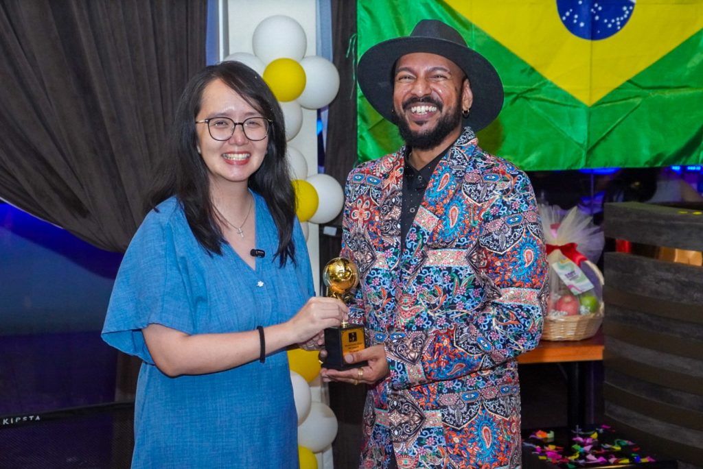 Michelle Ng (left) says the Digital Ministry’s approach to AI and the creative sector recognises the importance of original artistic expression and human creativity. She was the guest of honour at the launch of Justin Lewis’ song, World Fever.
