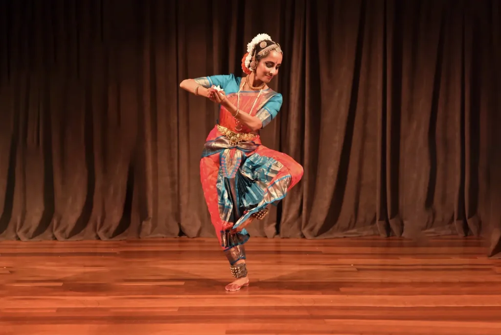 Sheela Rhagavan dancing on stage.