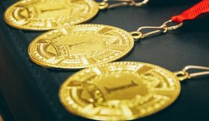 A tray of gold medals.