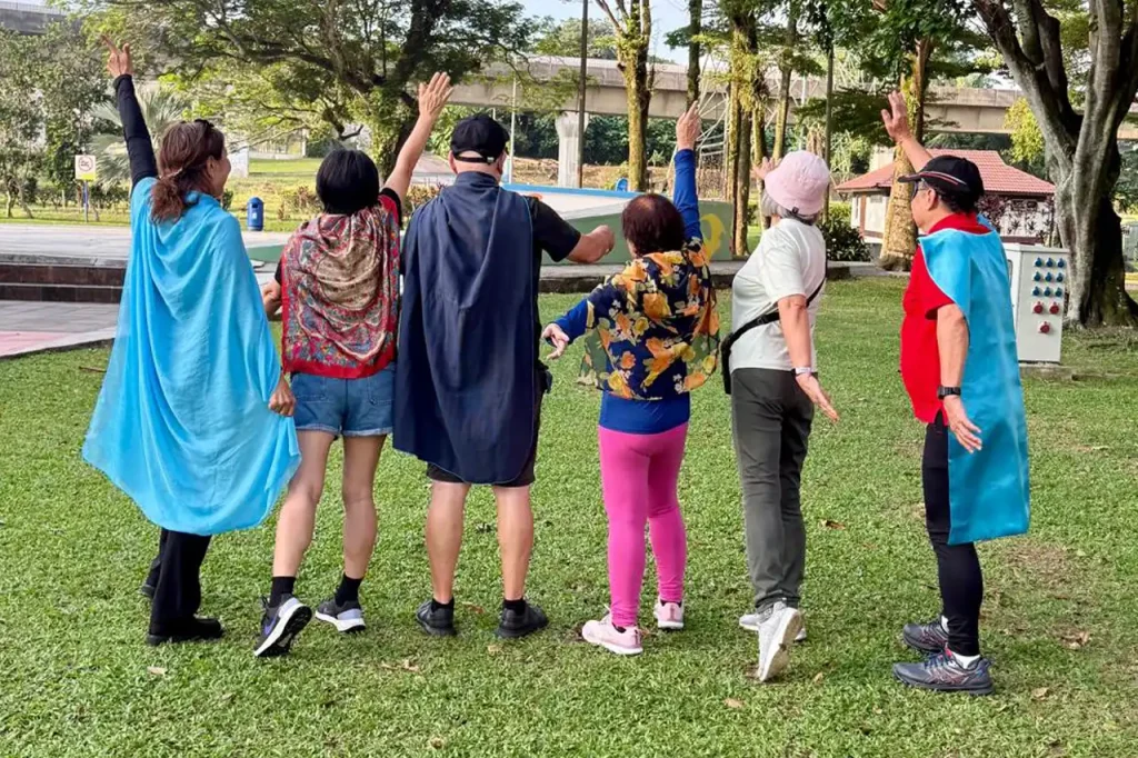 Group of elders striking a superhero pose while wearing capes at Taman Jaya, Petaling Jaya on July 31, 2026.