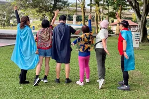 Group of elders striking a superhero pose while wearing capes at Taman Jaya, Petaling Jaya on July 31, 2026.