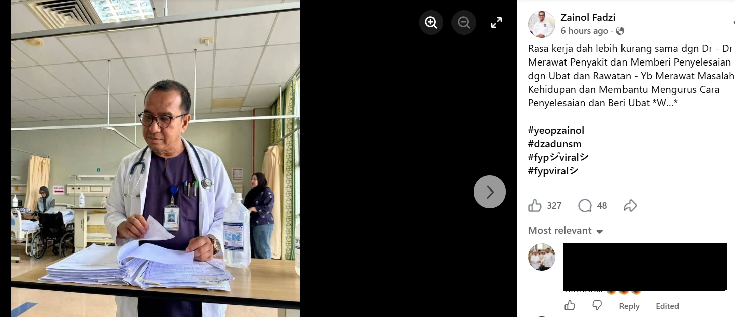 Datuk Zainol Fadzi in a white coat in a hospital ward.